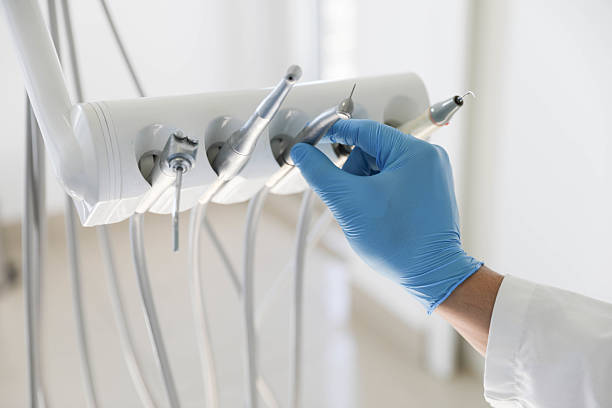 Professional Tooth Extraction technician working in Santa Clara, OR
